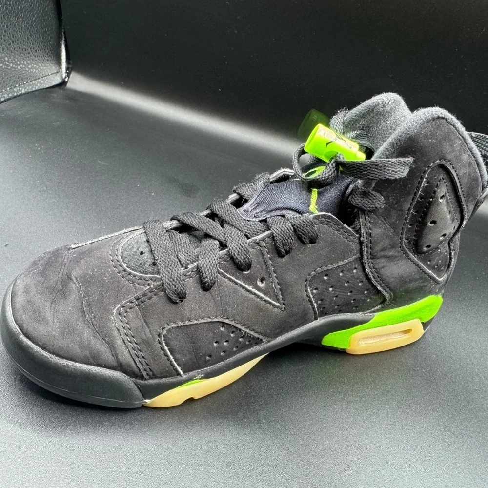 Jordan Black and Green Sneakers with Air Unit and Perforated Panels